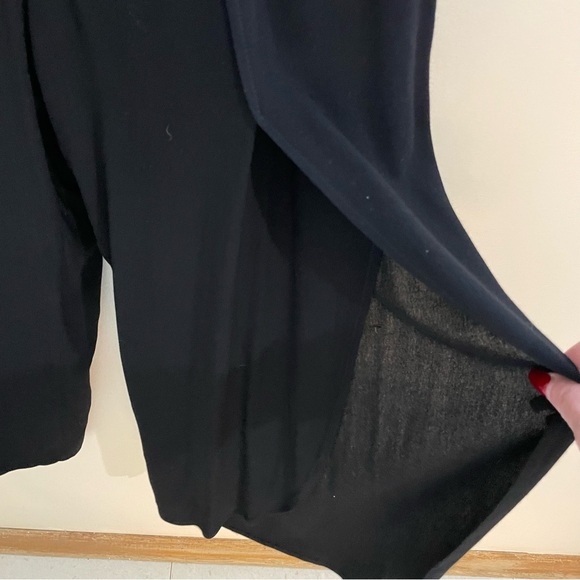 Melissa Nepton black off shoulder jumpsuit with flutter sleeves and tulip legs. - Picture 8 of 9